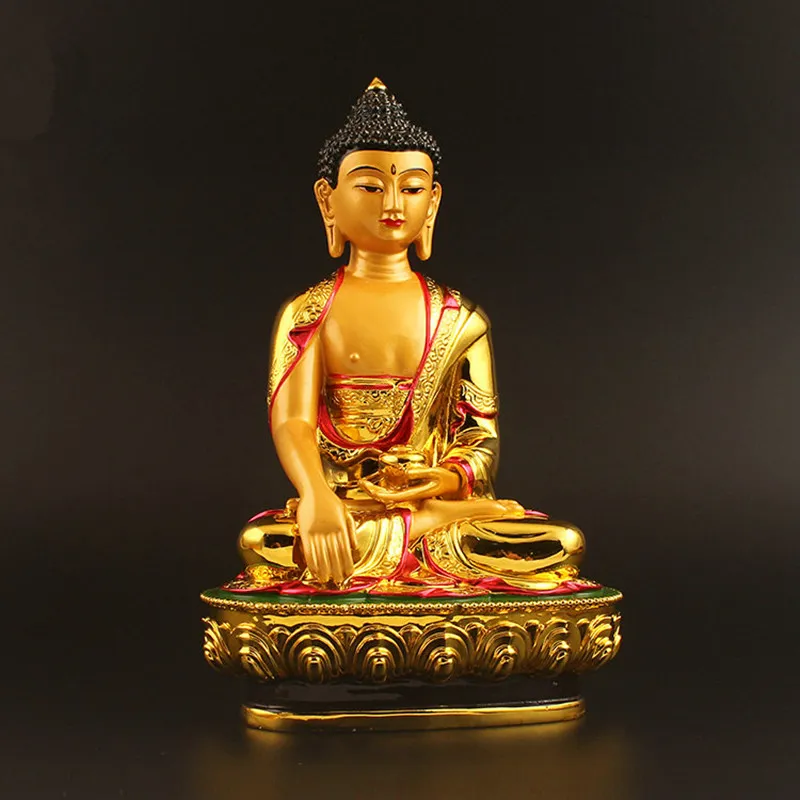 Gold Buddha statue placed in modern living room showing size scale and elegant home decoration.