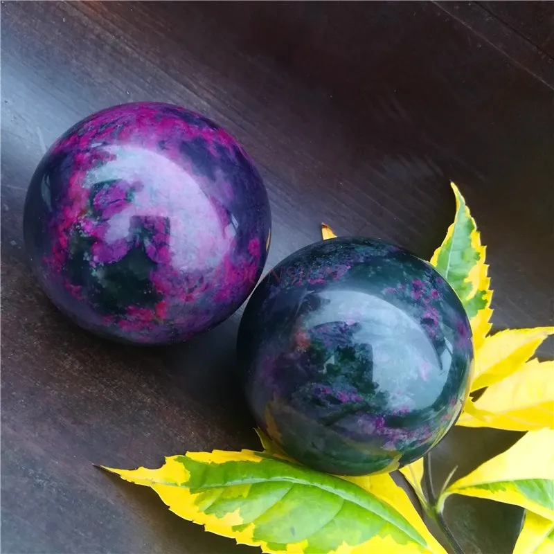 Natural agate Chinese Baoding meditation balls pair showing smooth polished surface and 5cm diameter.