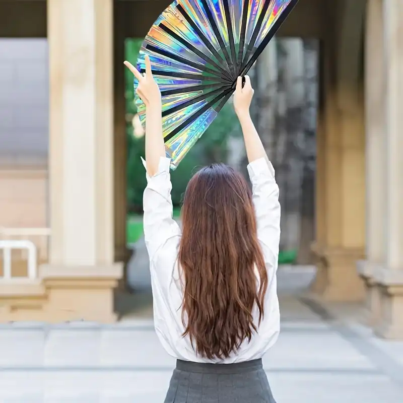 Multiple Japanese folding fans arranged as festive home decor and gift presentation display.