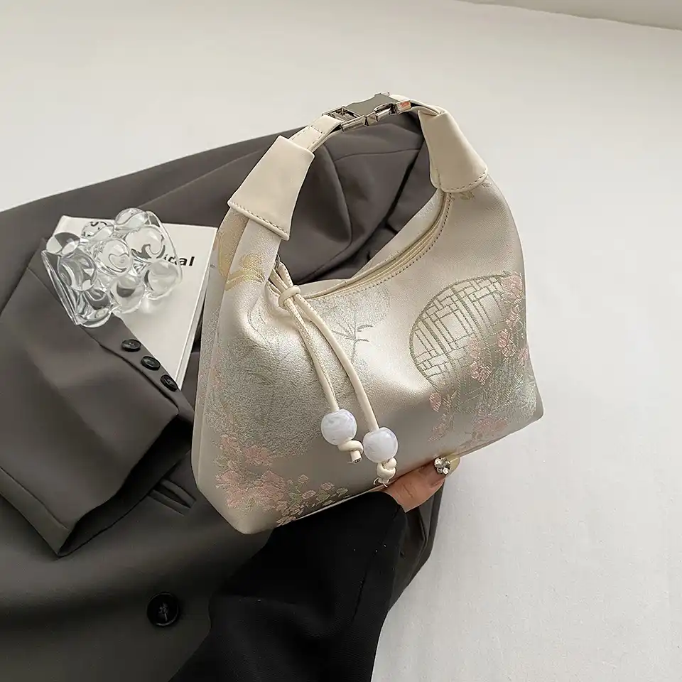 Interior organization showing spacious compartment and pocket functionality.