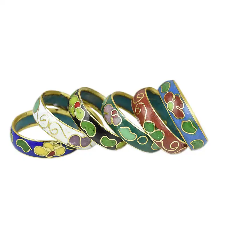 Set of 10 wholesale cloisonne rings displaying various colors and traditional patterns.