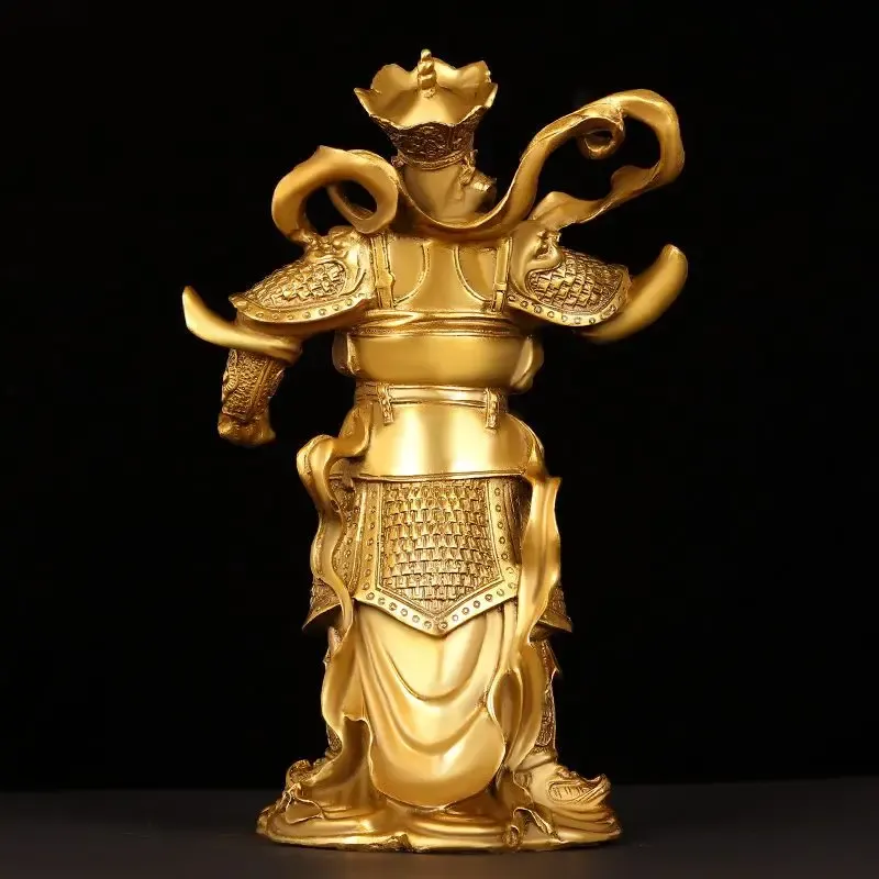 Individual copper Buddha guardian statue on meditation altar with incense and candles.