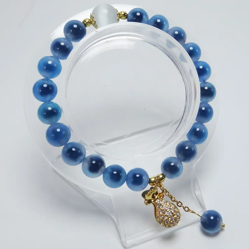 Natural blue agate crystal bracelet with money bag pendant for women's fashion jewelry.