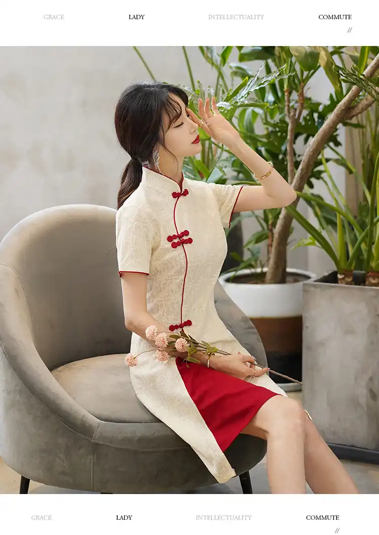 Model in vintage cheongsam for cultural event showing traditional heritage styling.