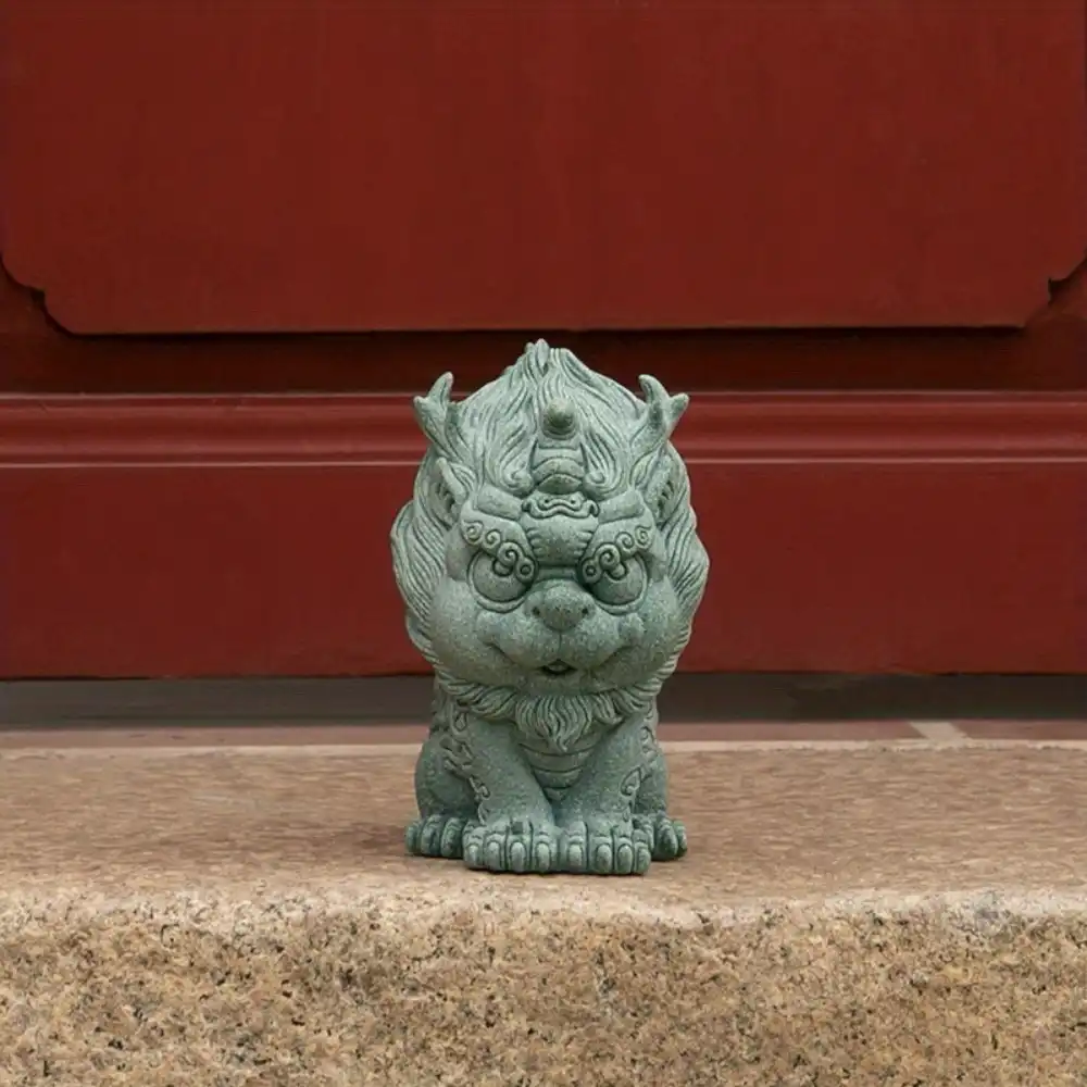 Green stone Qilin statue tea pet showing detailed carving and natural sandstone texture.