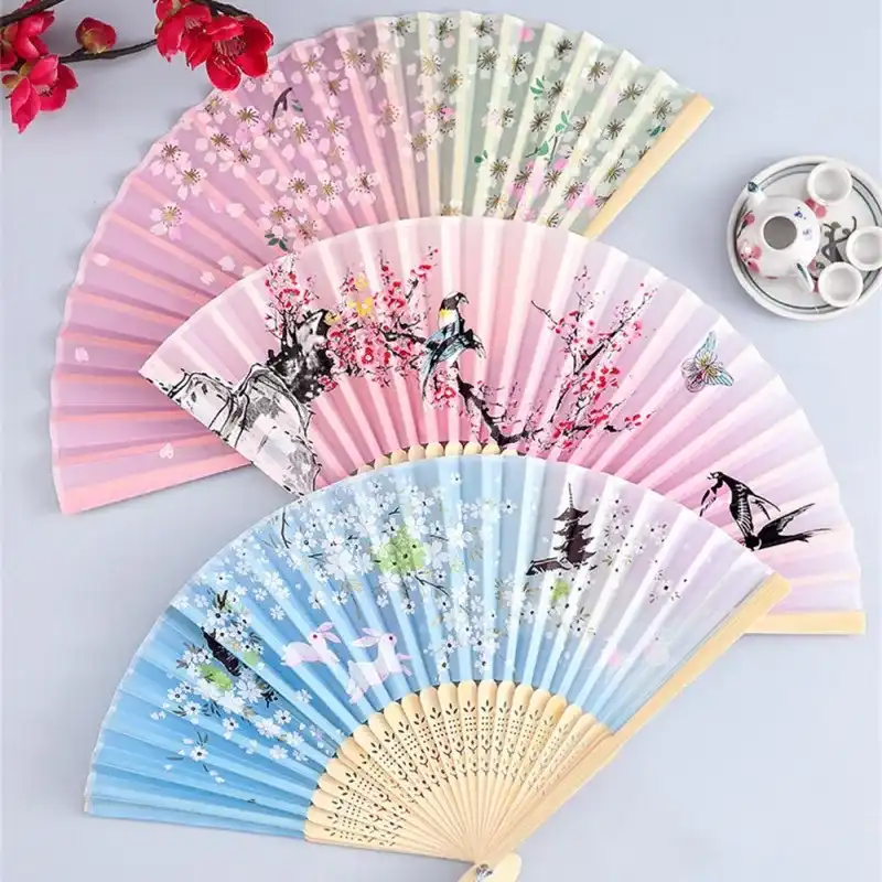 Japanese folding fan displayed as home decoration ornament on elegant interior wall setting.