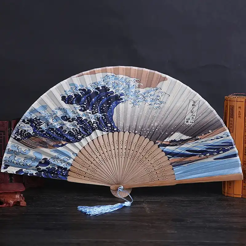 Handmade bamboo ribs of Japanese folding fan displaying traditional craftsmanship and natural wood texture.