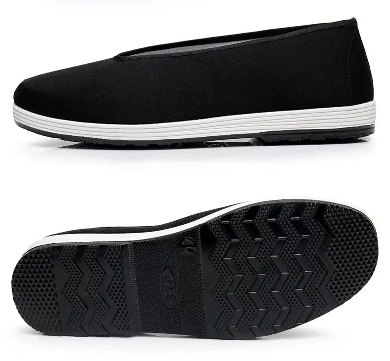 Traditional Chinese Kung Fu training shoes with black cotton cloth construction and elastic design.