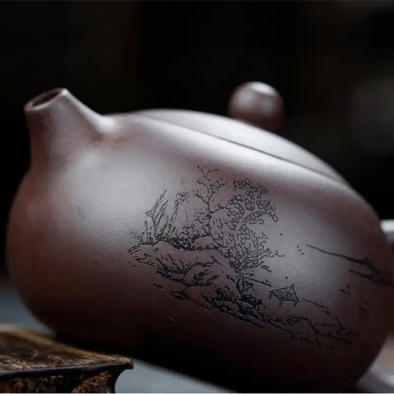 Overhead view of 420ml Yixing teapot highlighting capacity and interior clay texture details.