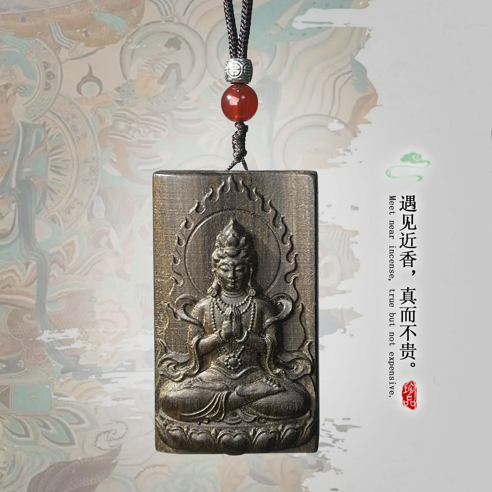 Buddhist amulet pendant being worn as spiritual jewelry necklace by person for daily protection.