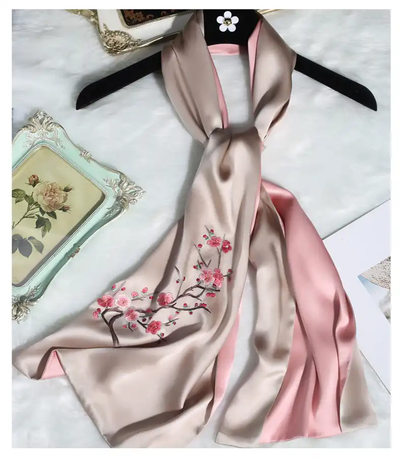 Luxury Suzhou embroidery scarf worn as elegant shawl demonstrating versatile styling options.