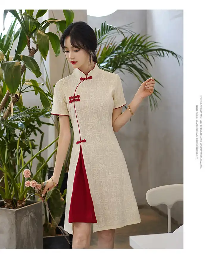 Vintage qipao dress styled with traditional accessories for complete cultural look.