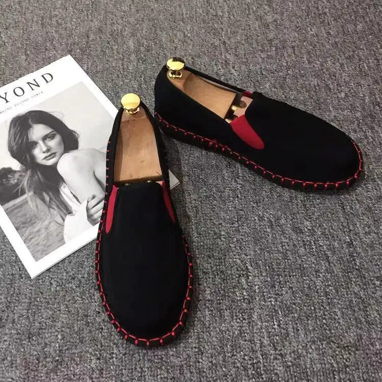 Embroidered flower detail on black cotton cloth shoes with traditional Chinese craftsmanship.