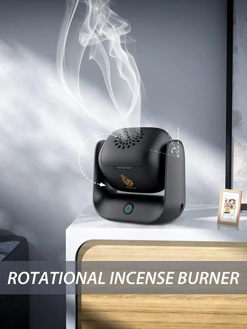 Electric incense burner in use with aromatic smoke and traditional bakhoor incense pieces.
