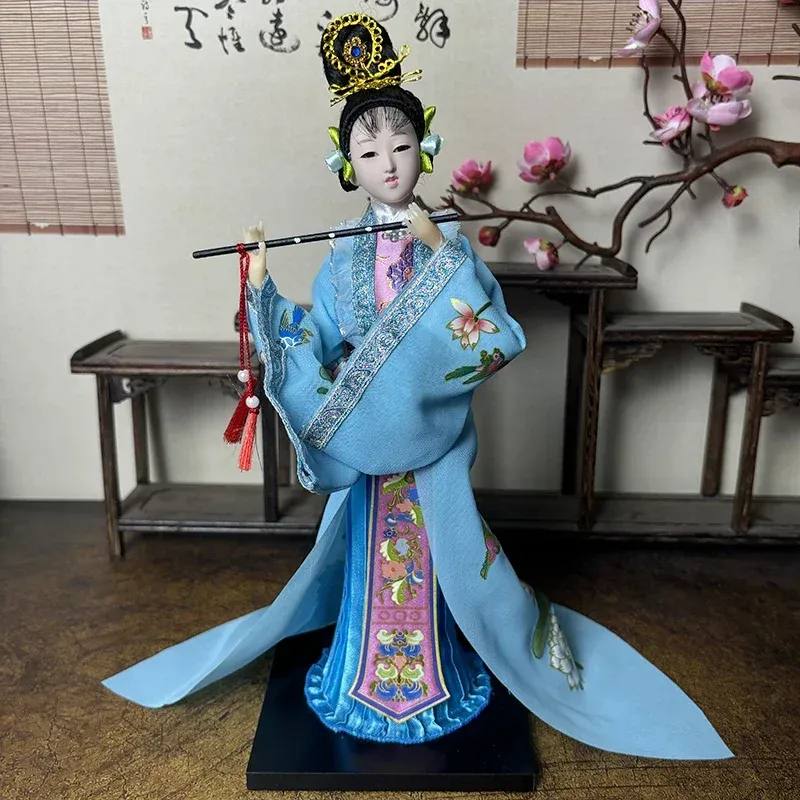 Back view of Beijing opera porcelain doll showing detailed costume construction.