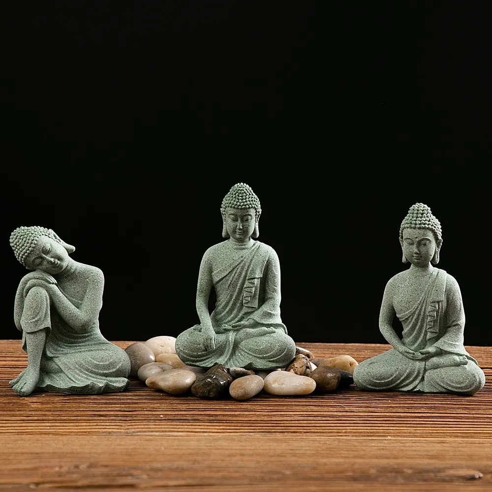 Close-up detail of Buddha statue showing peaceful expression and carved robe craftsmanship.