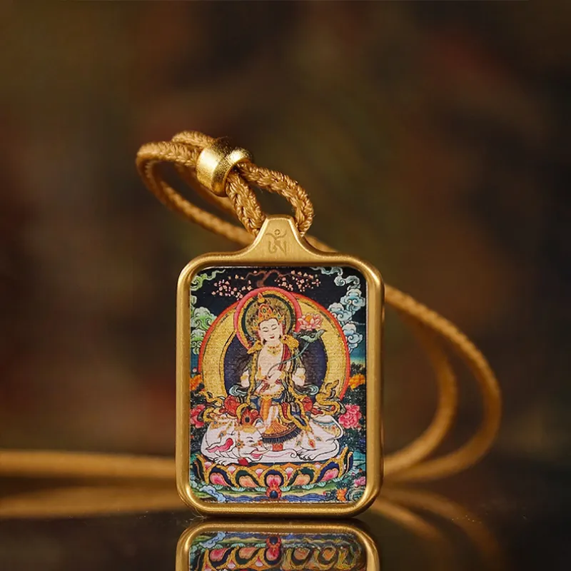 Buddhist amulet pendant with Samantabhadra and sacred symbols in vintage gold style.