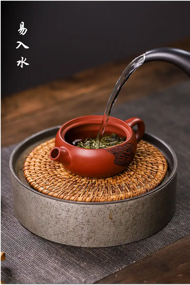 Kung Fu tea brewing technique using Dragon Blood Sand Zen teapot with proper pouring method.