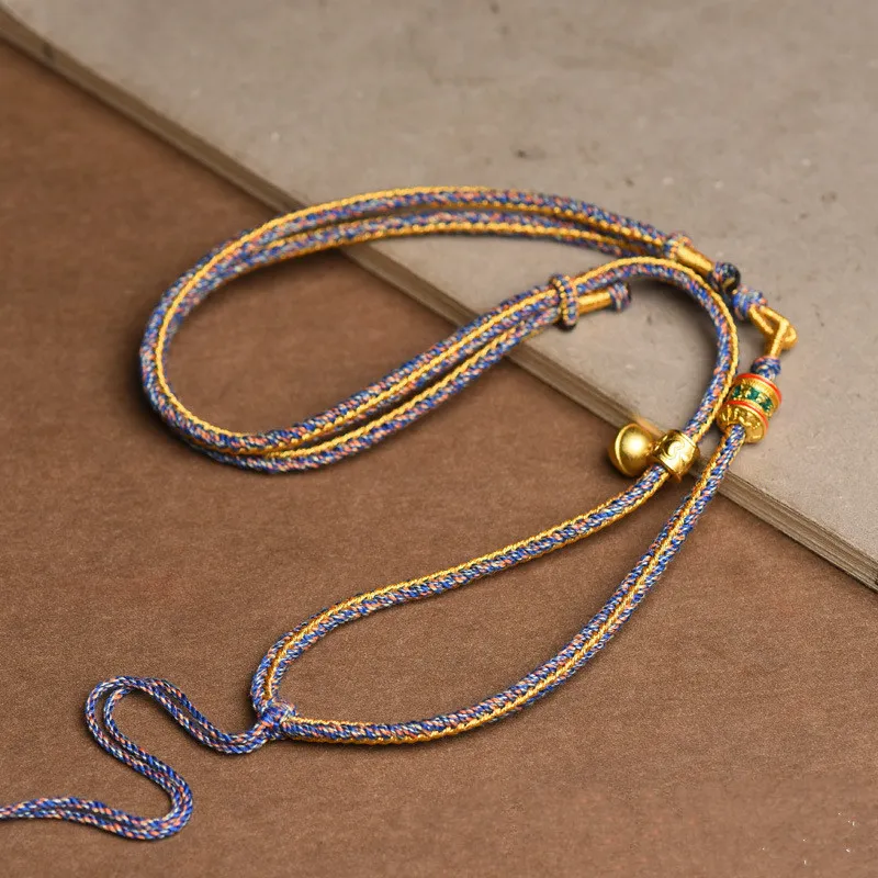 Man wearing handwoven cotton rope necklace Tibetan style unisex ethnic jewelry.