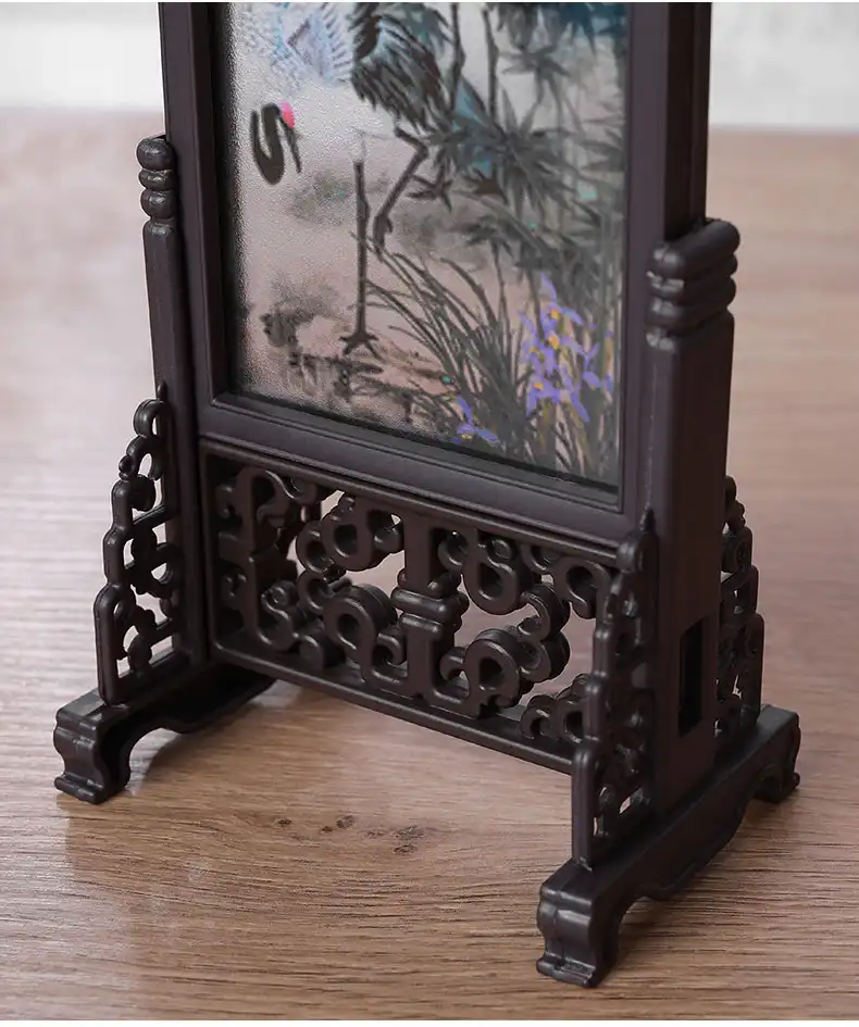 Close-up detail of intricate resin craftsmanship showing brushstroke patterns in landscape artwork.