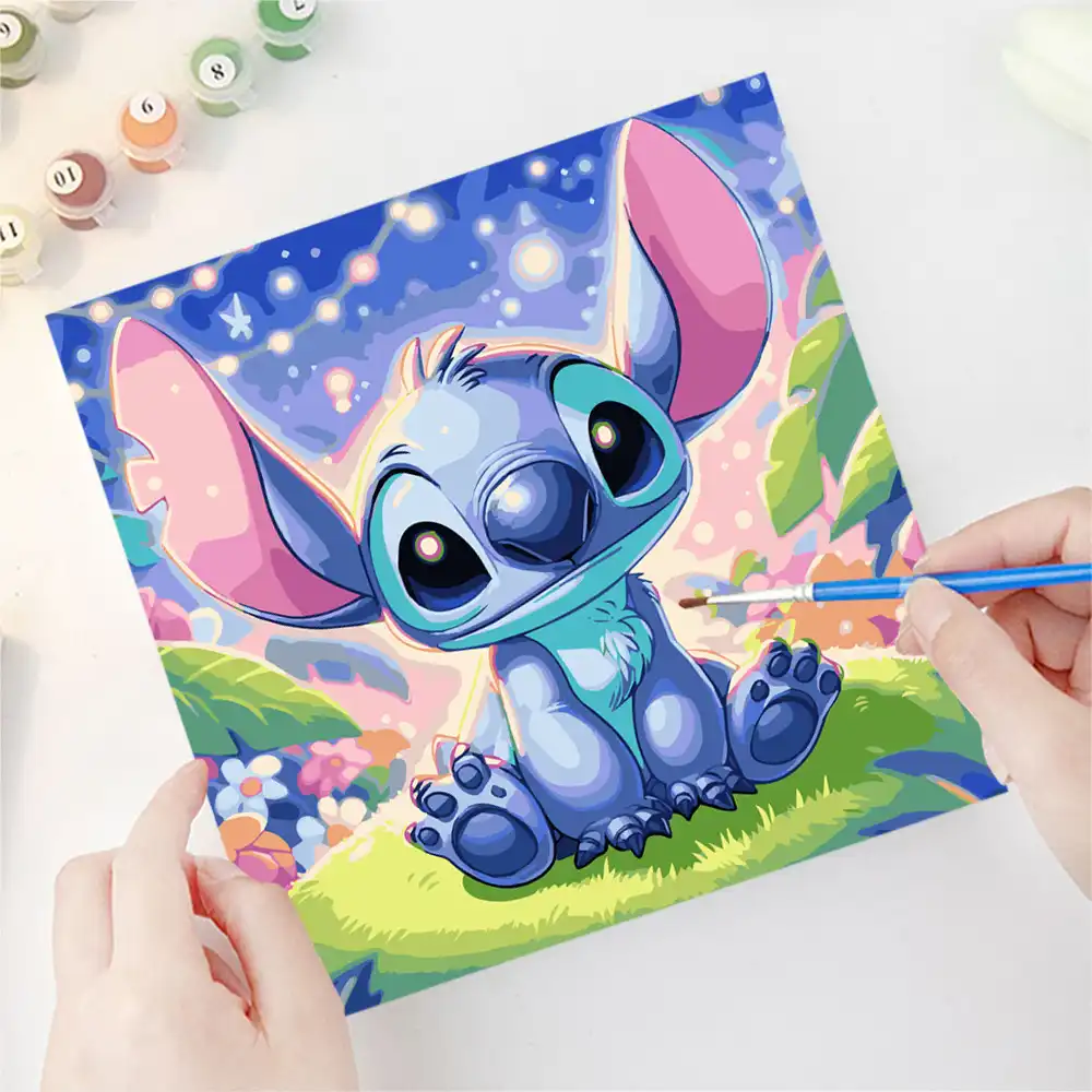 Disney Lilo Stitch paint by numbers kit showing canvas with numbered sections and paint set.