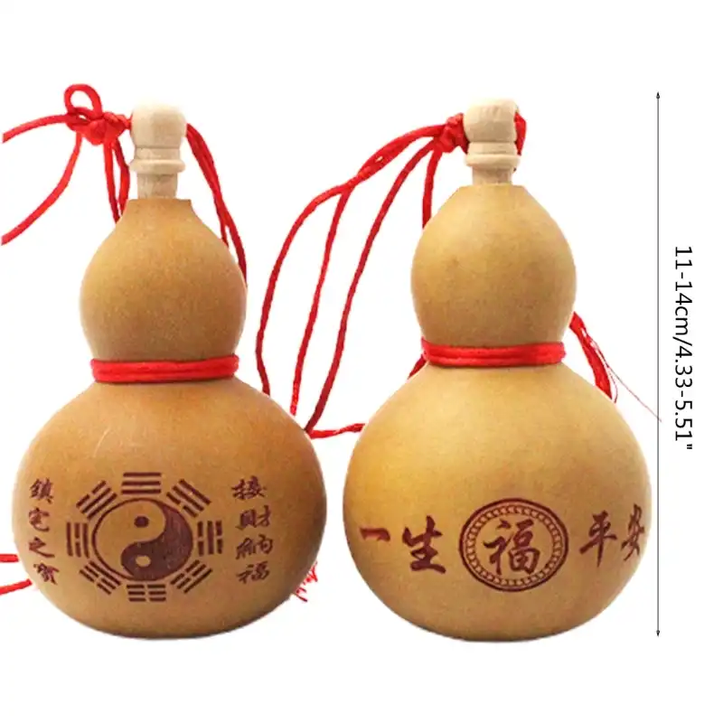 Chinese traditional carved wine gourd ornament with feng shui patterns and natural gourd material.