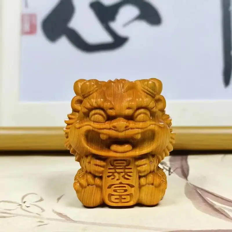 Handcrafted wooden foo dog statue pair made from natural cypress wood showing traditional Chinese design.