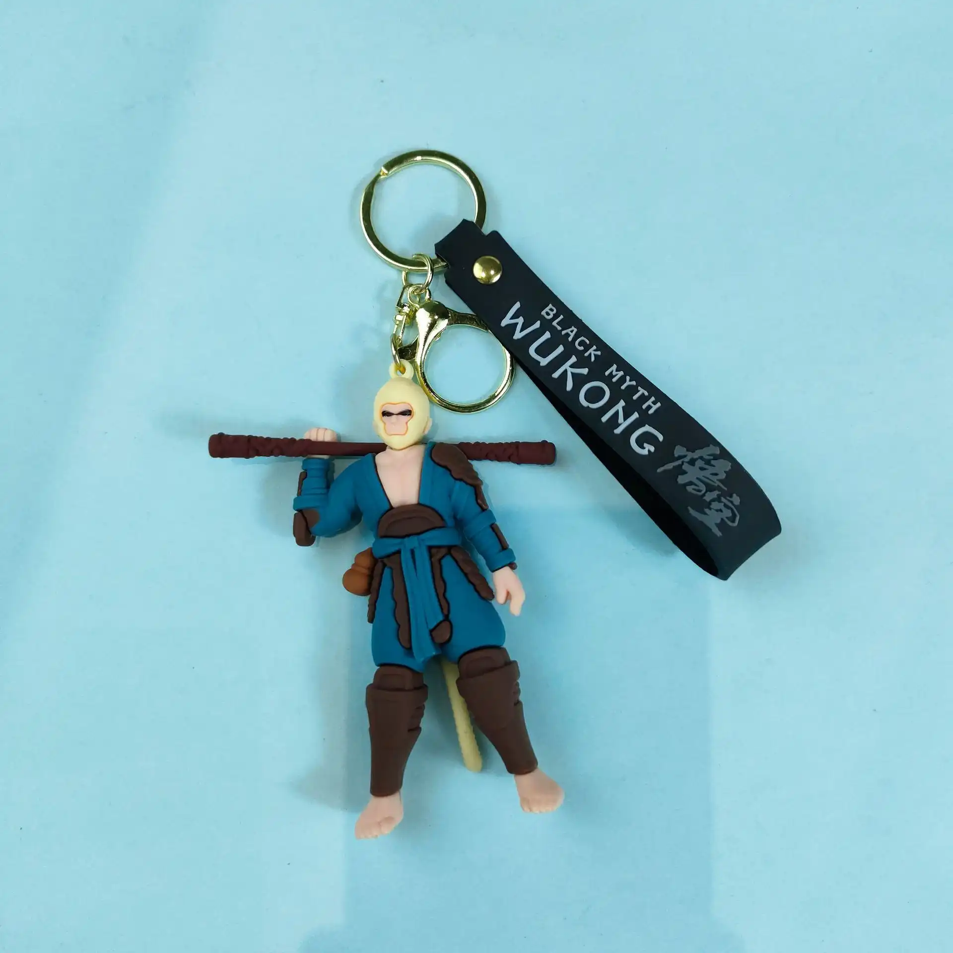 Black Myth Wukong metal rubber keychain showing jewelry pendant design with O-shaped buckle and zinc alloy construction.