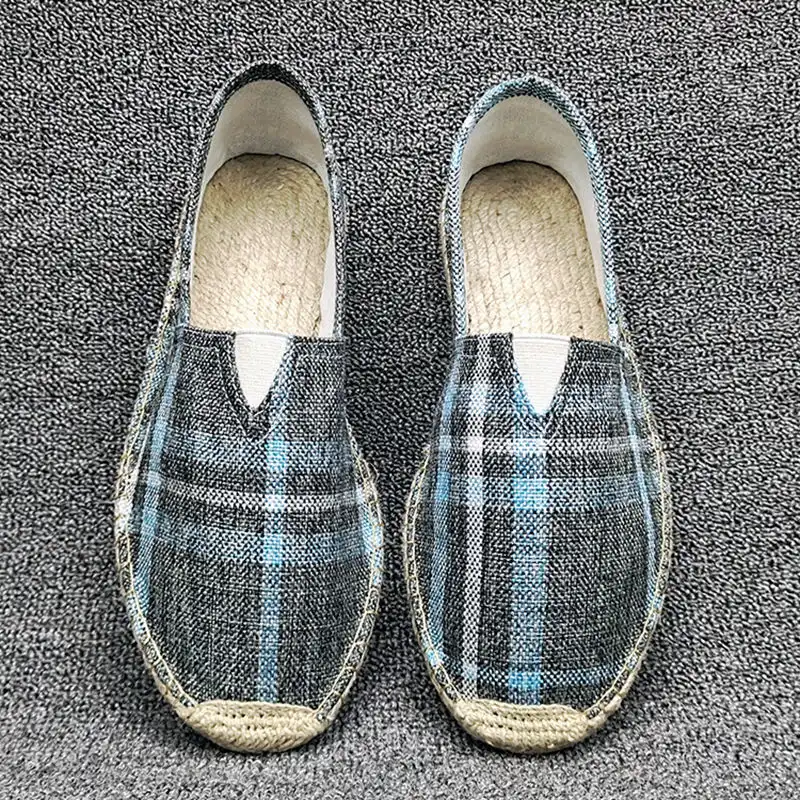 Close-up of vintage Wushu shoe sole displaying cow muscle outsole with anti-slip pattern.