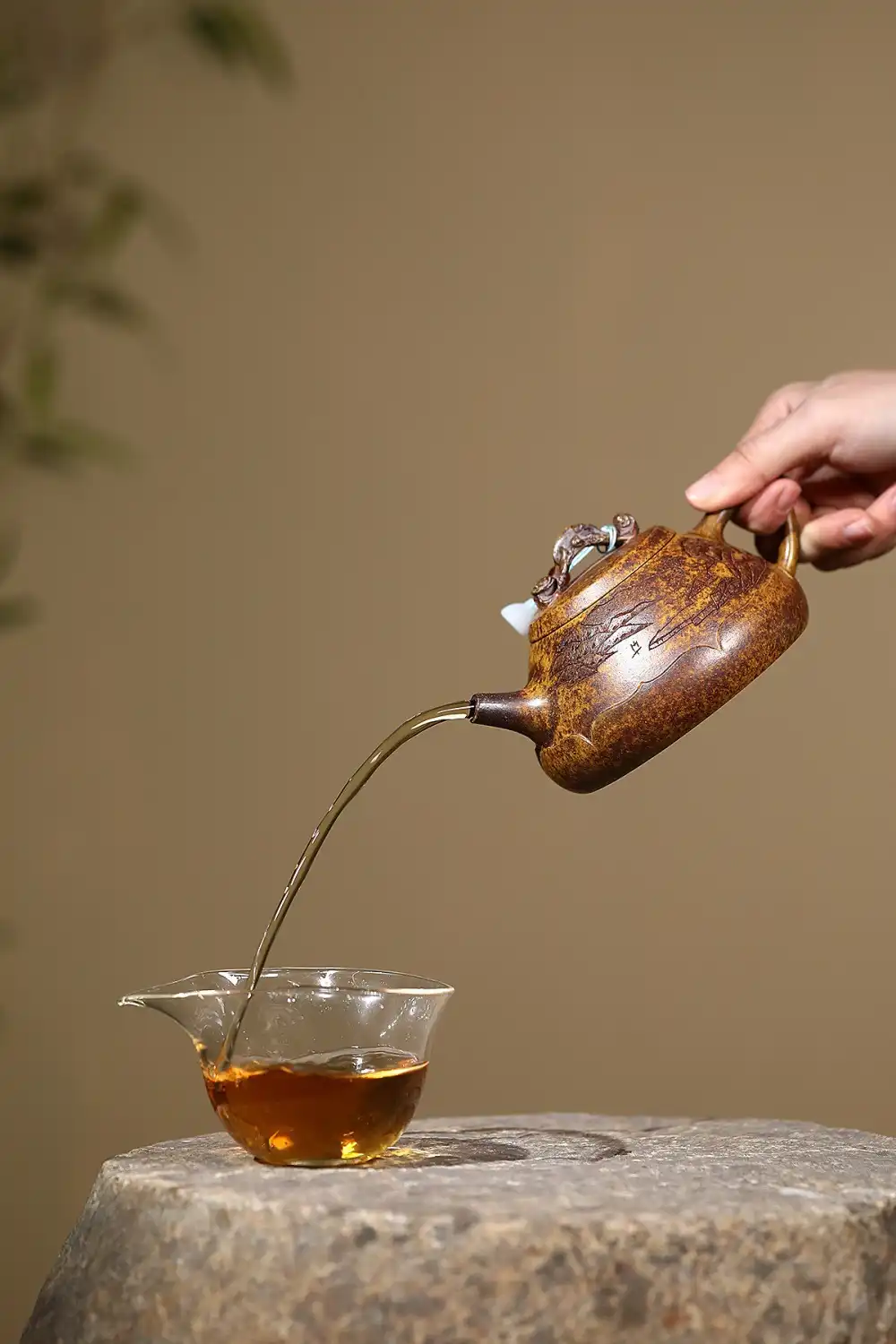 Traditional Chinese teaware collection featuring authentic stone ladle purple clay brewing vessel.