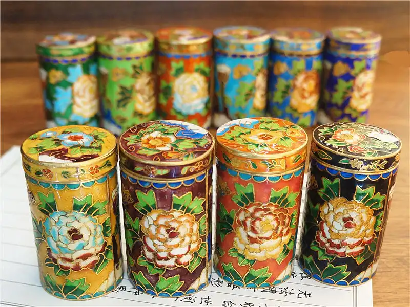 Desktop placement of cloisonne toothpick holder demonstrating compact size and decorative appeal.