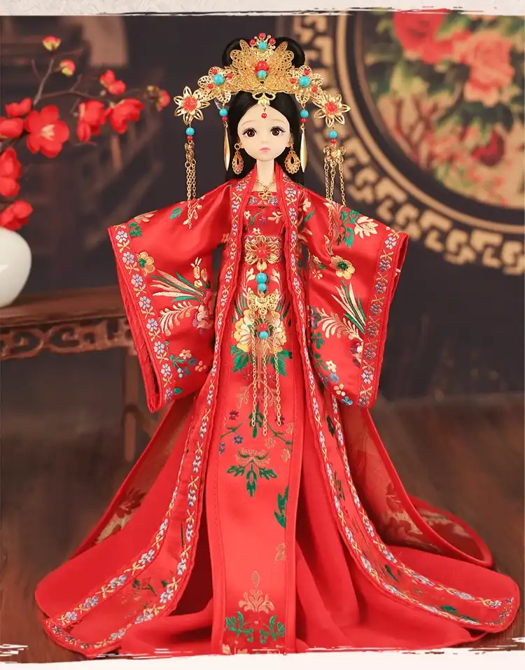 Chinese ancient costume doll showing intricate embroidery and traditional dress patterns.