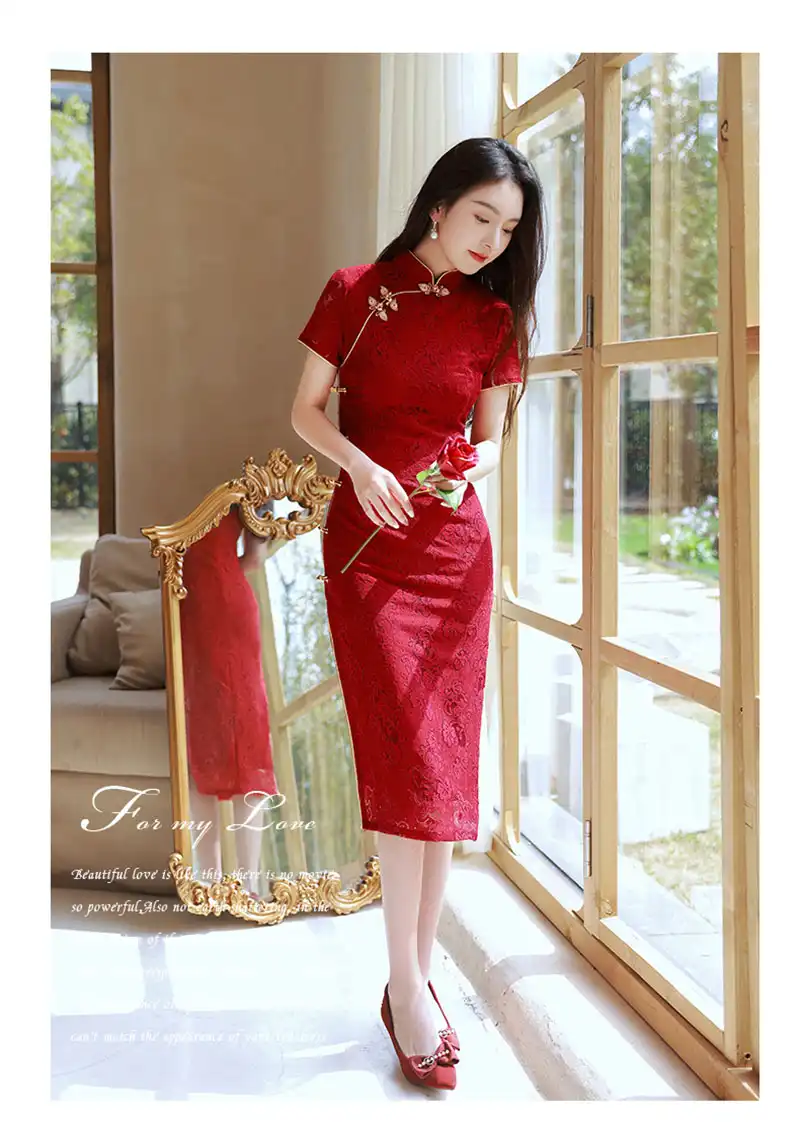 Model in wine red cheongsam demonstrating comfort and movement in broadcloth fabric.