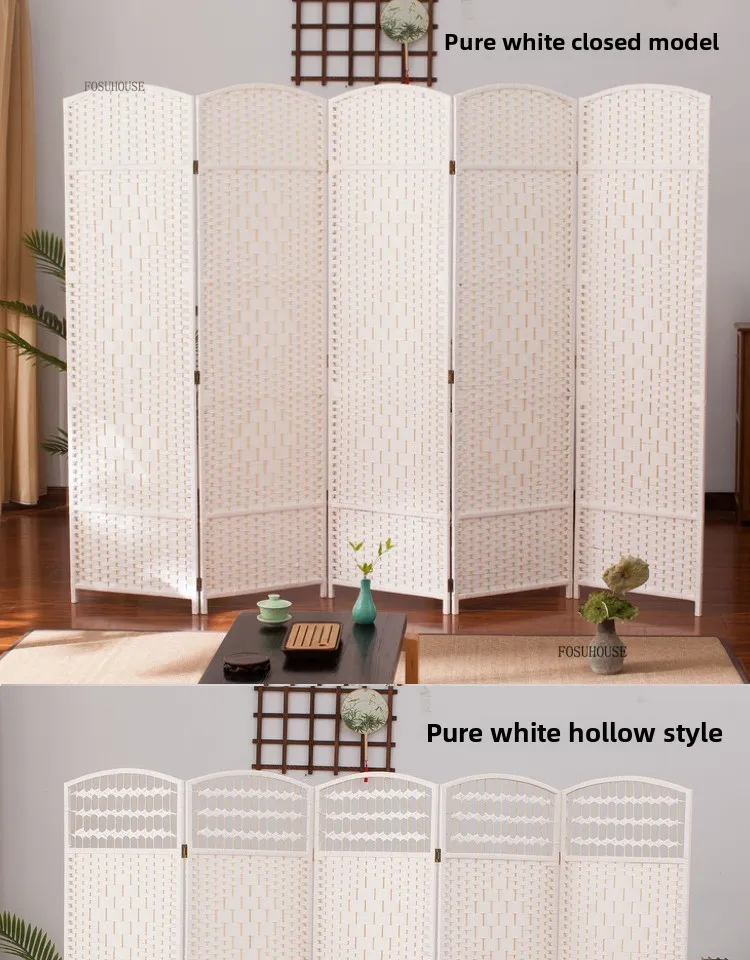 Screen used as bedroom decoration element adding cultural design to modern interior.