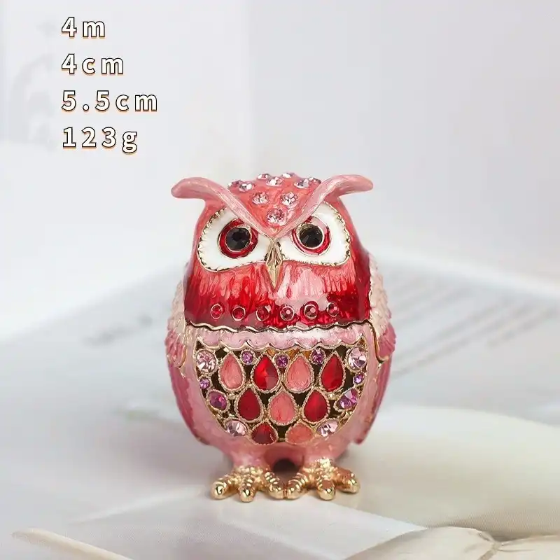 Cloisonne owl ornament box positioned on vanity table as elegant home decoration piece.
