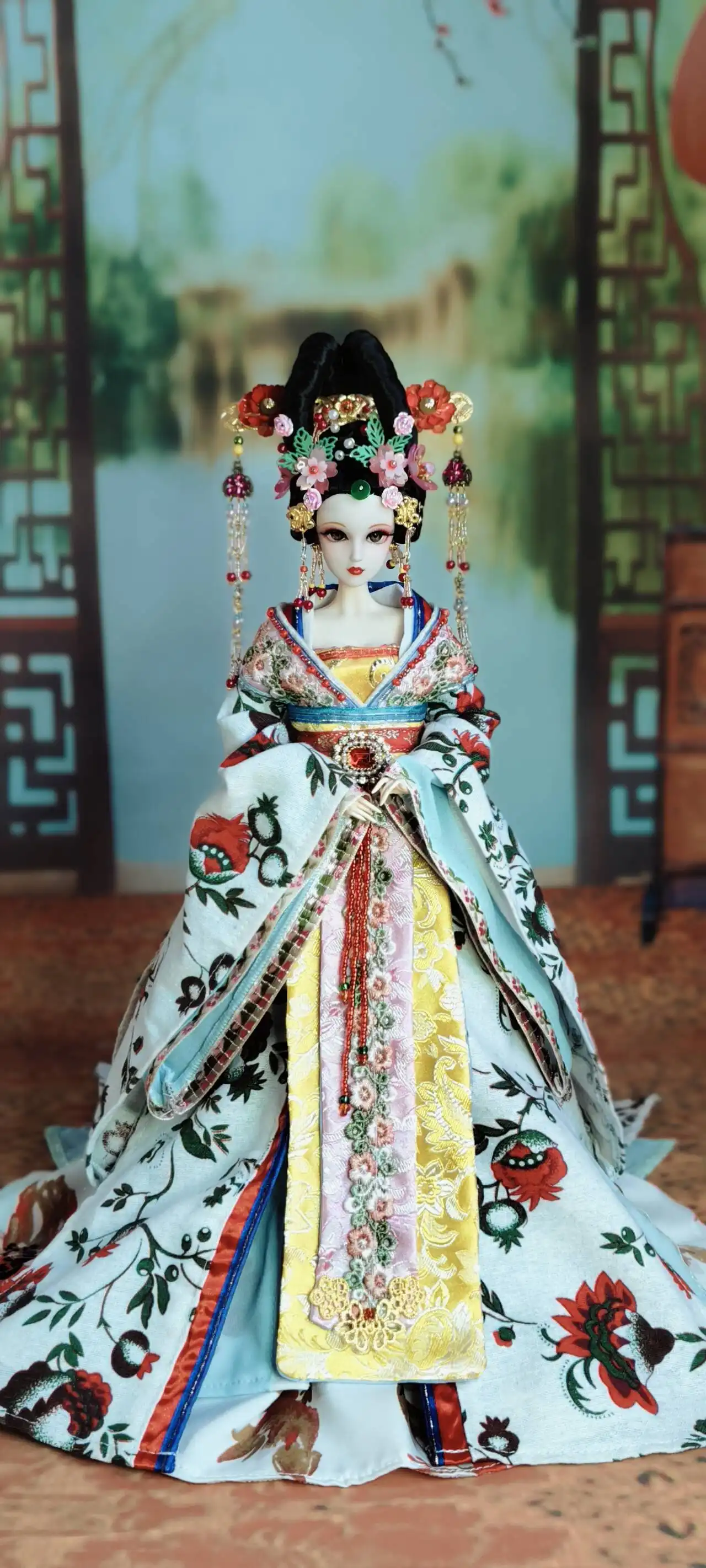 Back view of Chinese costume doll displaying complete traditional dress design elements.