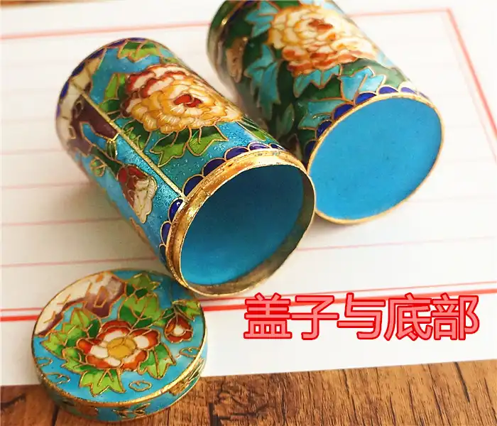 Cloisonne toothpick holder with lid open displaying functional storage and vintage craftsmanship.