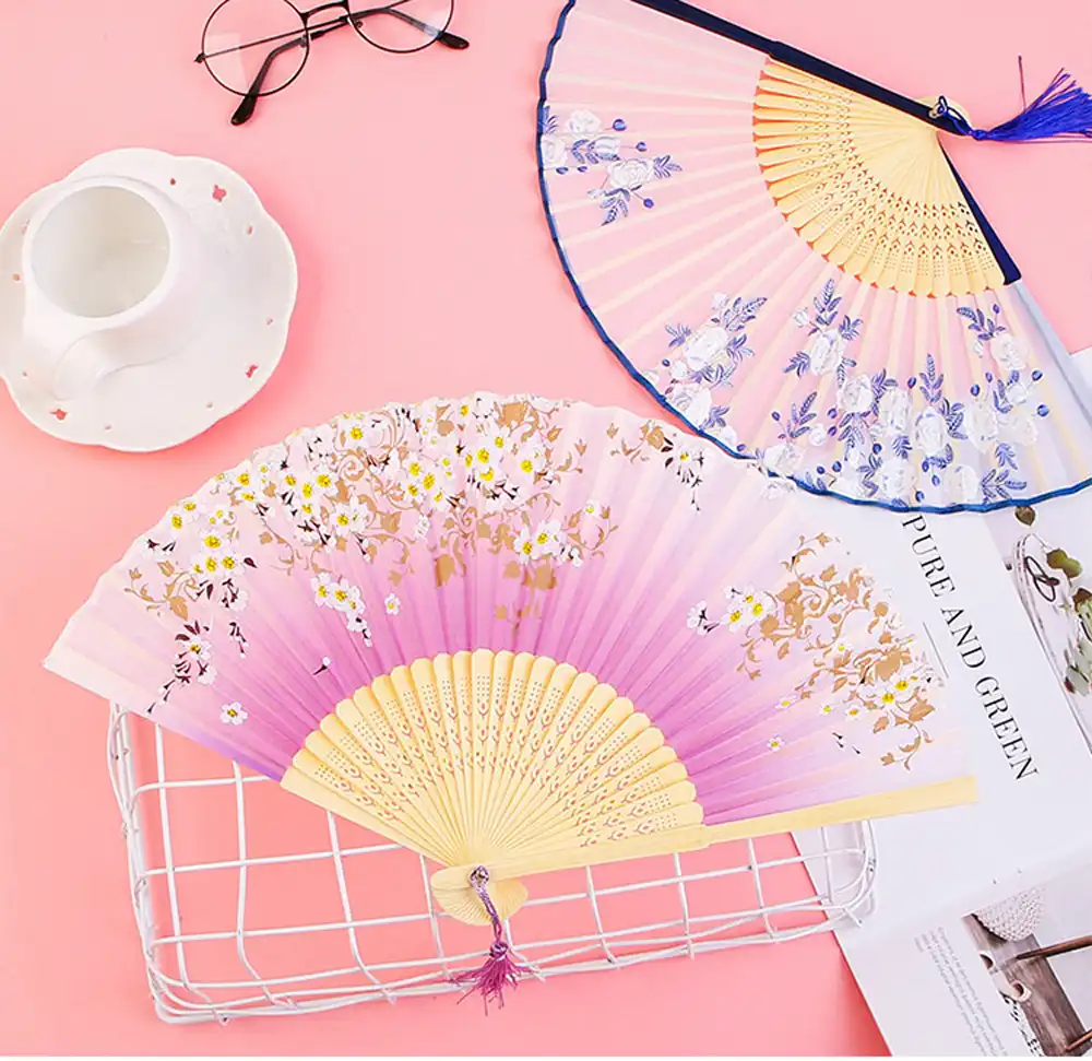 Black bamboo fan used for traditional Chinese dance performance and cultural events.