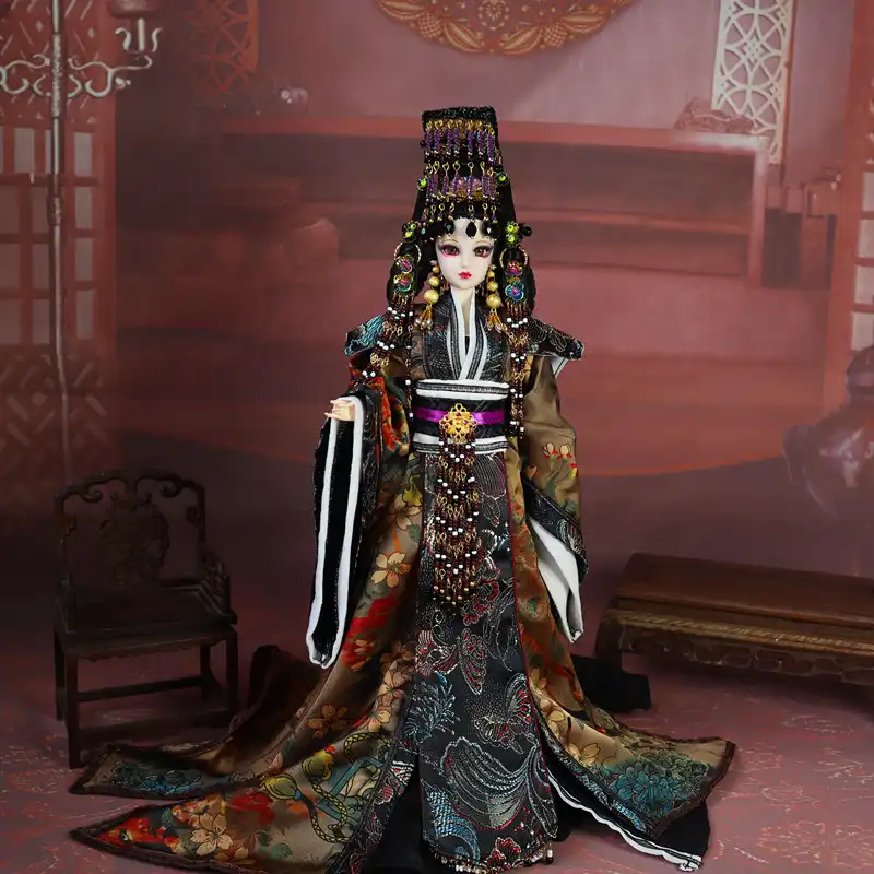 Detail shot of traditional Chinese court dress showing intricate patterns and decorations.