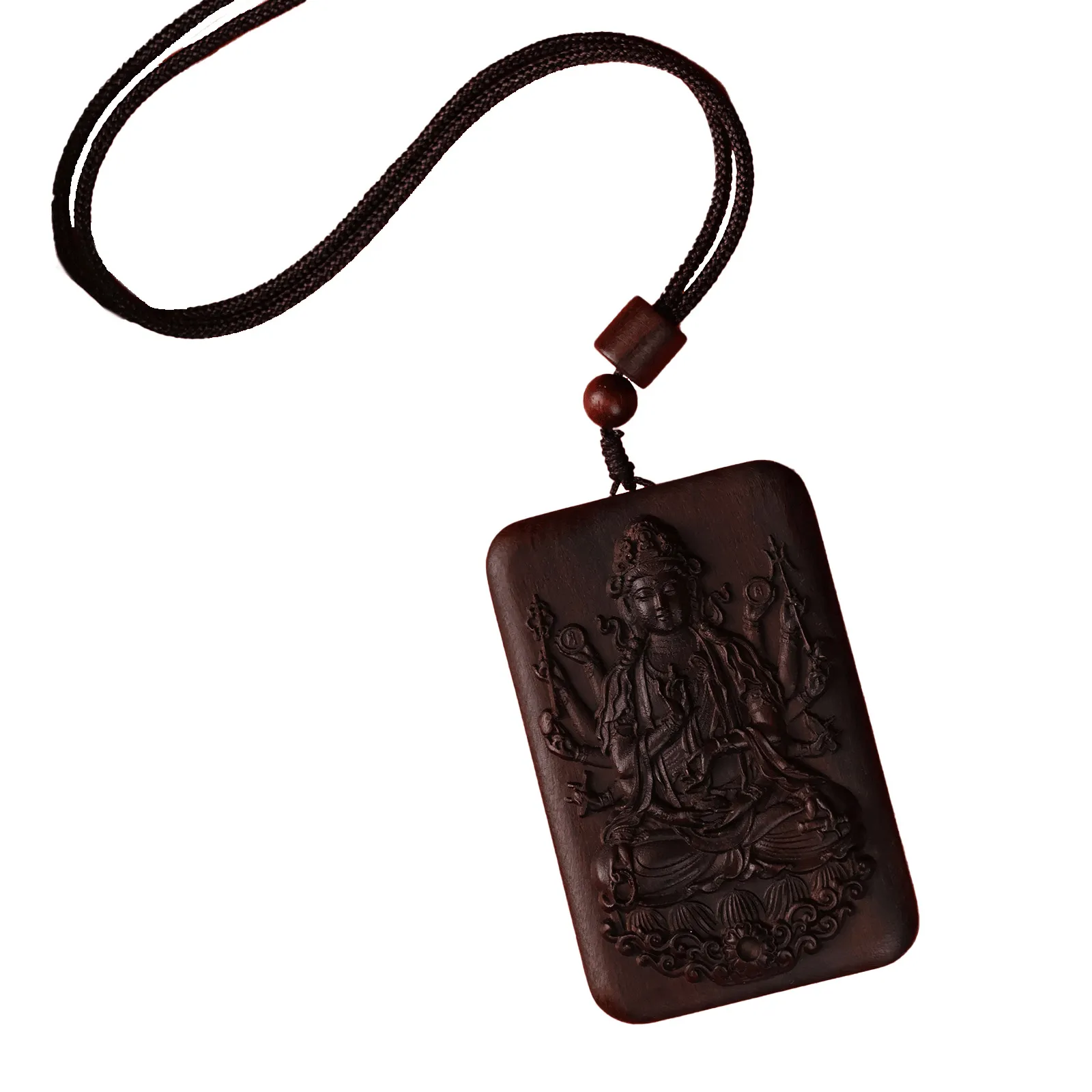 Side view showing depth and craftsmanship of carved Thousand Hand Guanyin agarwood pendant.