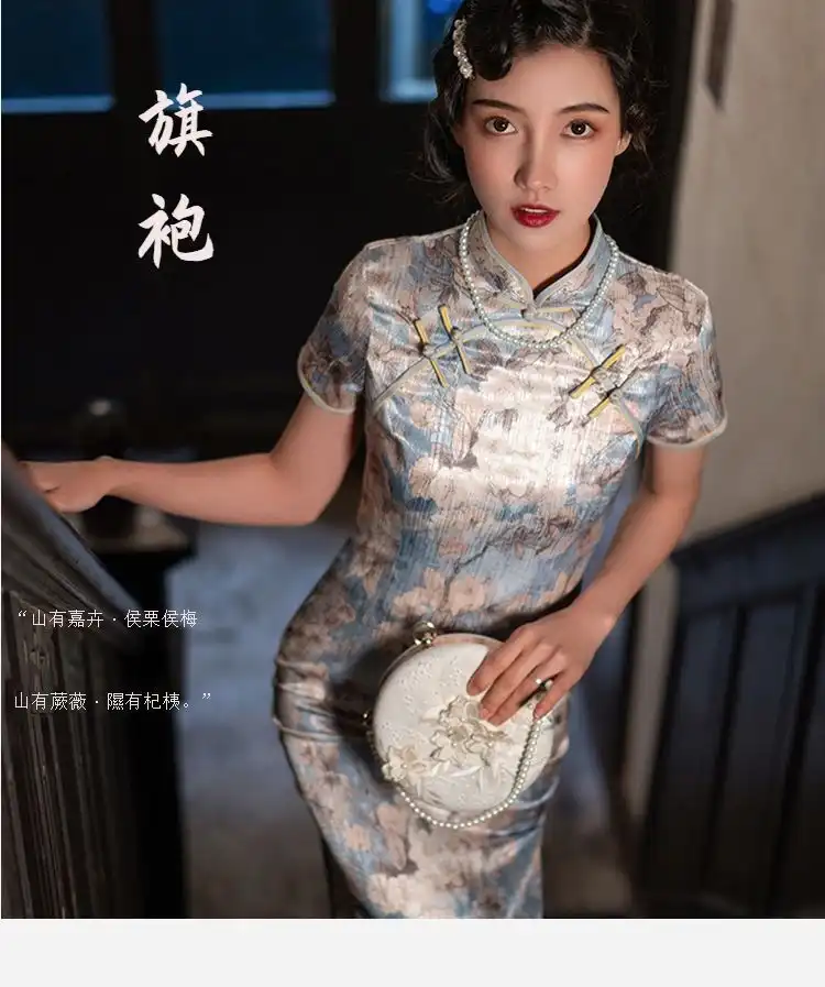 Close-up of mandarin collar and authentic Chinese button closure craftsmanship details.