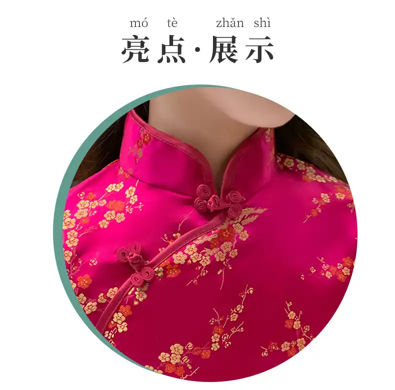 Child wearing authentic Chinese cheongsam dress with classic mandarin collar styling.