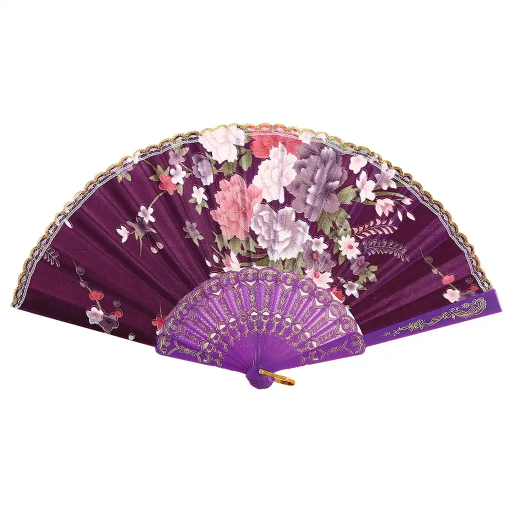 Gold decorated plastic ribs of traditional Japanese hand fan highlighting premium construction quality.