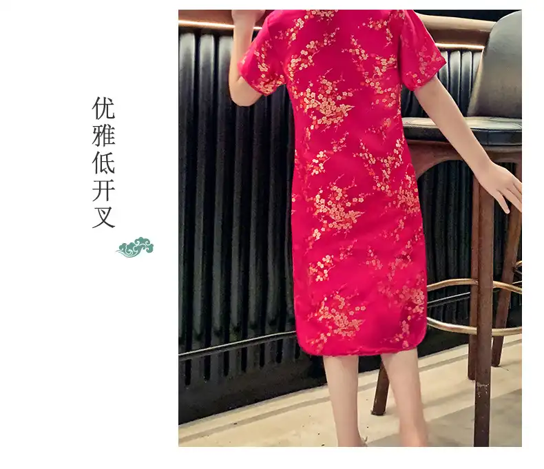 Modern girls qipao dress in pink showing elegant traditional Chinese button details.
