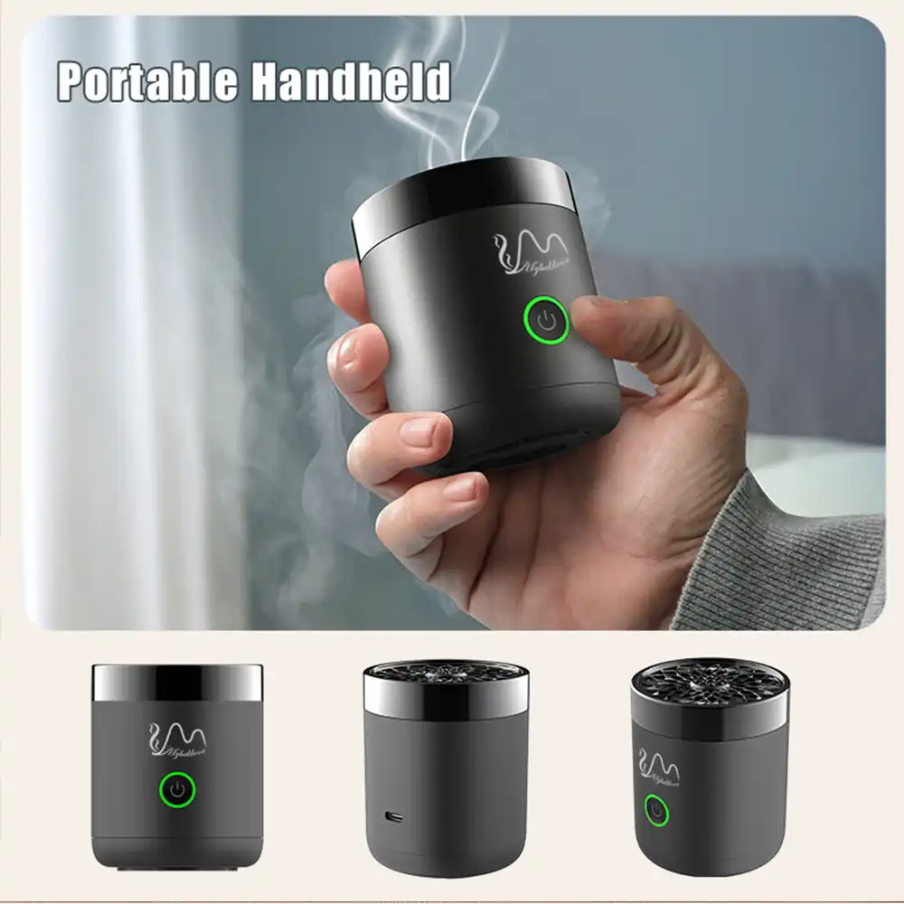 Electric incense burner being held in hand showing compact water cup sized dimensions.