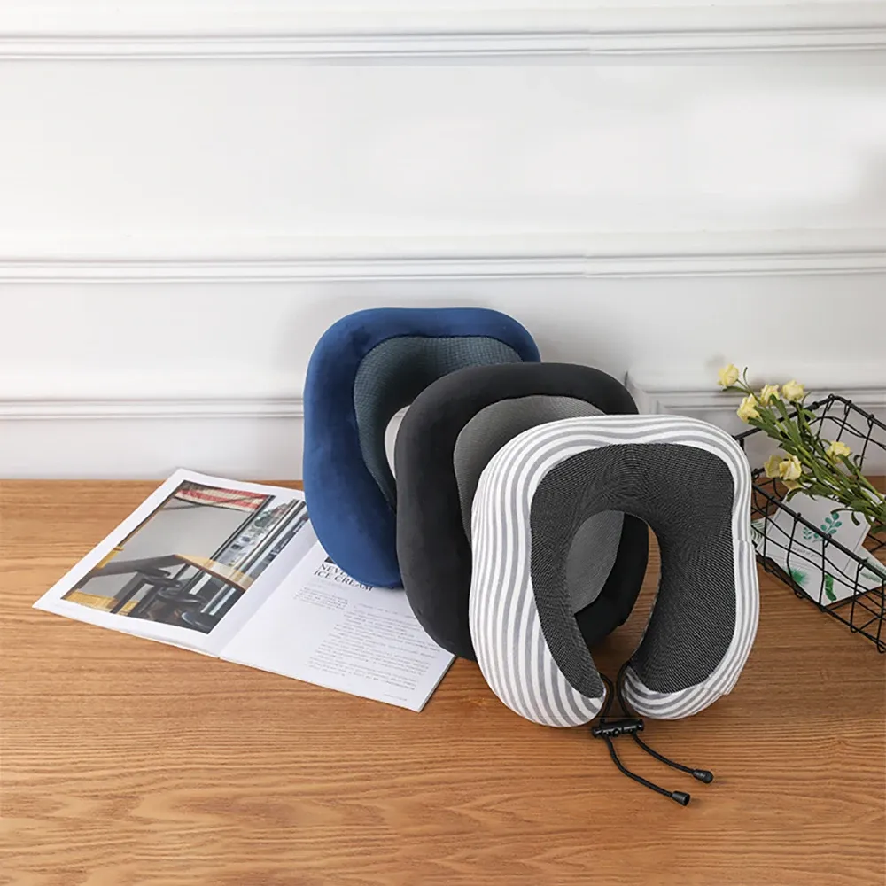 Travel pillow being used at home on sofa chair showing multi-purpose decorative functionality.