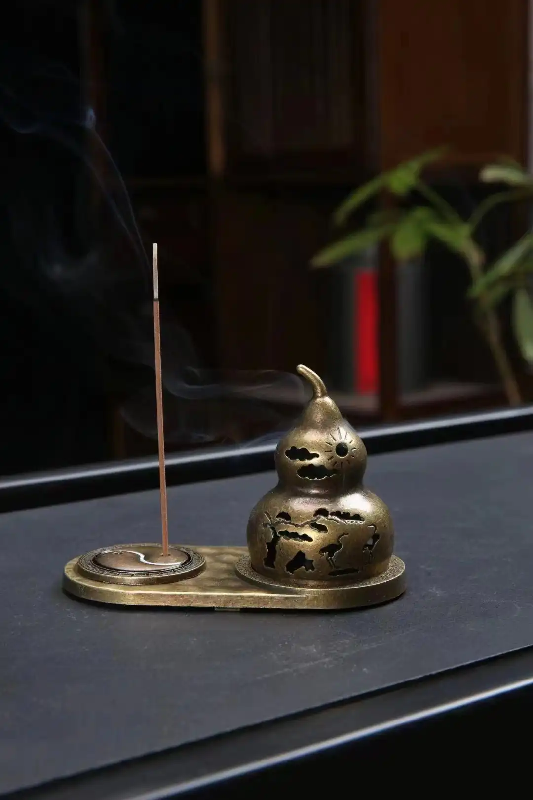 Bronze bagua gourd incense burner with traditional Chinese feng shui design for meditation and aromatherapy.