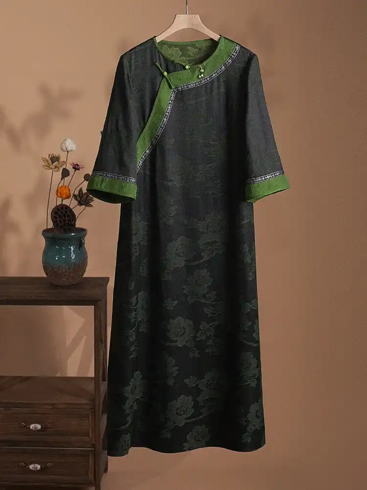 Full length model shot demonstrating versatile styling of Xiangyunsha silk Tang suit dress.