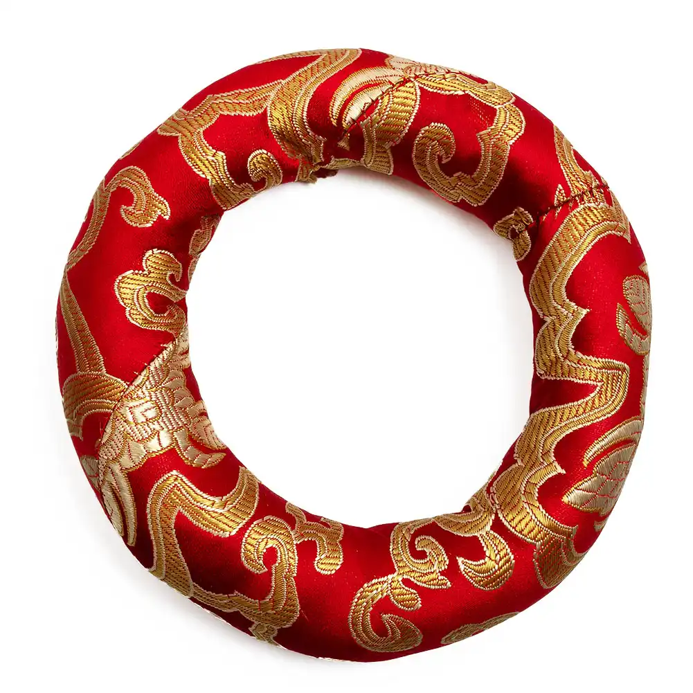 Colorful meditation pillow showing red, blue, and yellow brocade fabric options available.