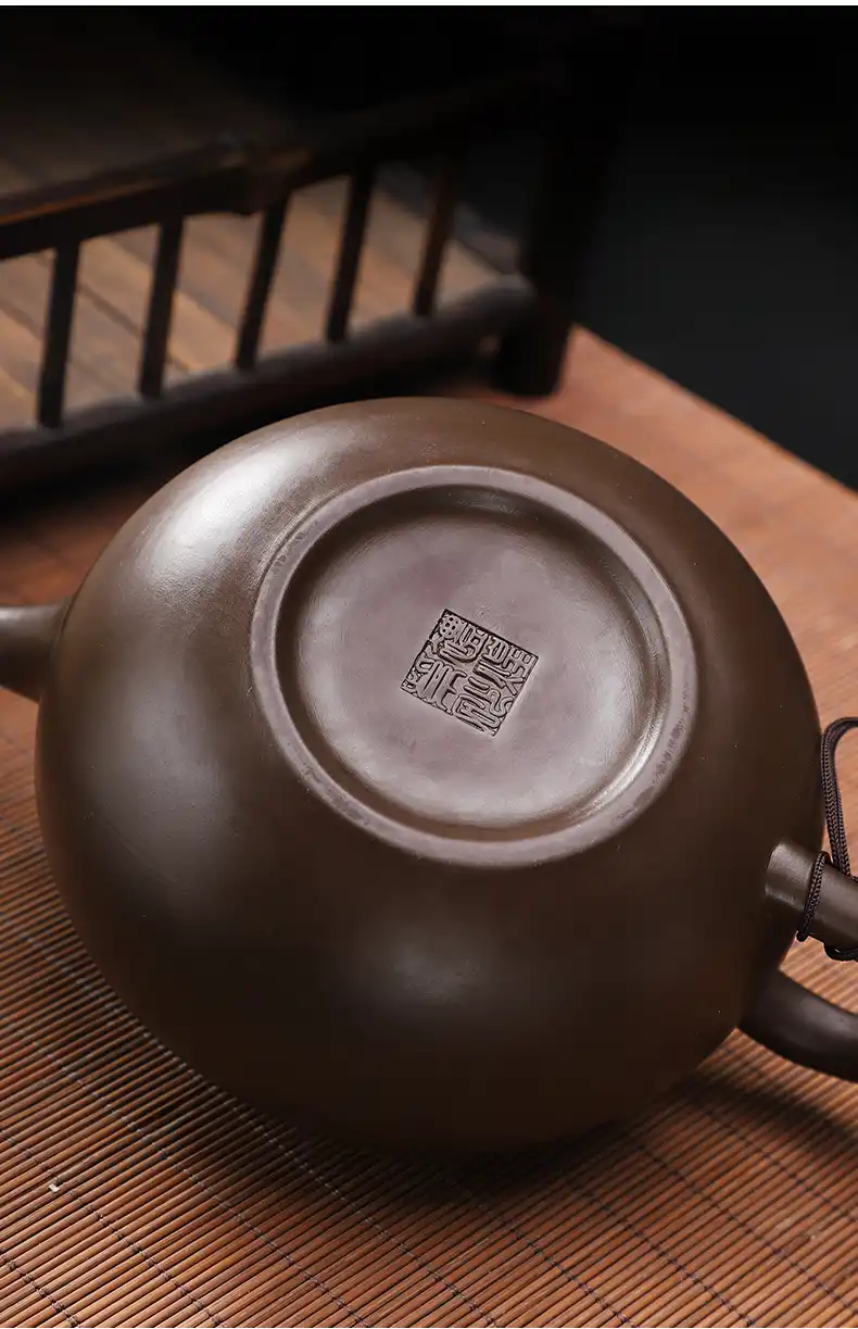Complete tea set arrangement featuring Yixing purple clay beauty teapot with matching accessories.